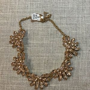 Peachy colored necklace